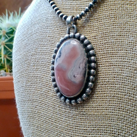 Rhodonite Pendant — Engraved by Richard Brooks