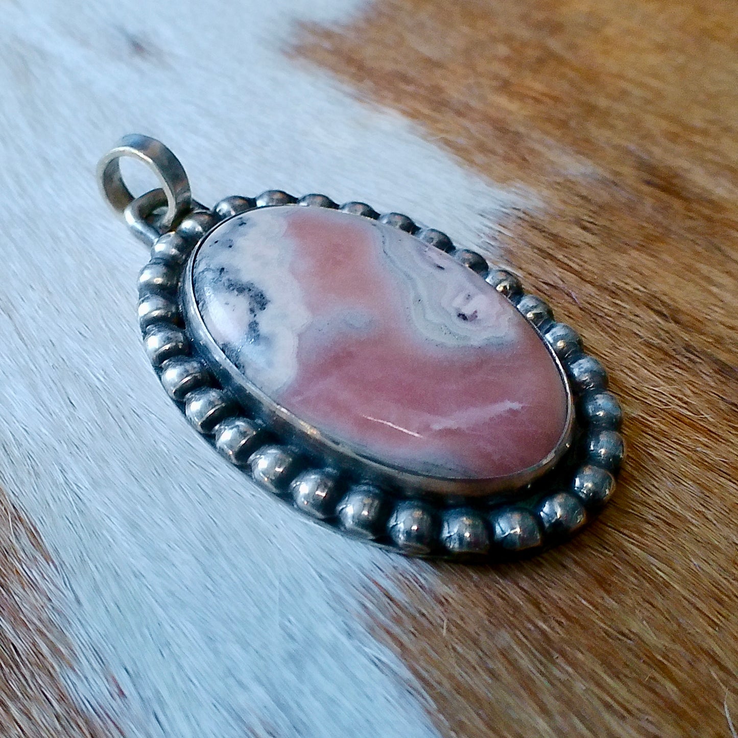 Rhodonite Pendant — Engraved by Richard Brooks