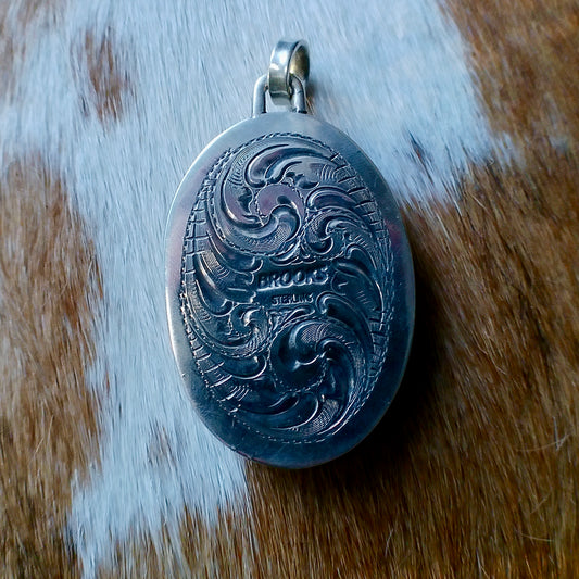 Rhodonite Pendant — Engraved by Richard Brooks